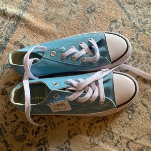 blue low top sneakers
